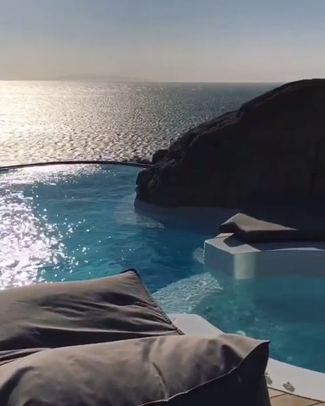 Luxury Cave Hotel in Mykonos, Greece - The Perfect Couples Getaway! Located in the Aegean Sea! This is a real luxury experience similar to the Santorini Version!  Perfect for an Engagement, Honeymoon or even a wedding!  #Cavehotel #luxuryhotel #mykonos #Greece #Santorini #LuxuryVacations #honeymoon #floatingbreakfast #anniversary   Video IG: @cavetogomyconos Santorini Greece Honeymoon, Things To Do In Mykonos, Cavo Tagoo, Anniversary Video, Grecia Santorini, Cavo Tagoo Mykonos, Couples Getaway, Greece Honeymoon, Cave Hotel