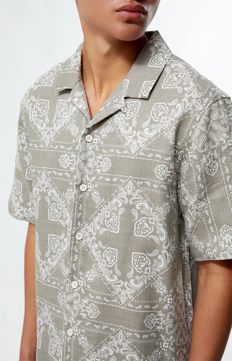 Add a touch of retro flair to your wardrobe with the PacSun Paisley Camp Shirt. This shirt features a classic camp collar, short sleeves, and a relaxed fit for effortless style. With a vibrant paisley print, it's perfect for creating a laid-back yet statement-making look. Whether you're heading to a beach party or a casual outing with friends, this shirt is sure to turn heads.   	Collared neckline 	Short sleeves 	Regular fit 	Button closures 	Paisley print 	100% Cotton 	Machine washable 	Model is wearing size medium 	Model Measurements: 6'0” Height, 36L Suit, 30” Waist, 32” Inseam Neo Classic, Camp Shirt, Camping Shirt, Beach Party, Shirt Price, Pacsun, Paisley Print, Model Measurements, Effortless Style