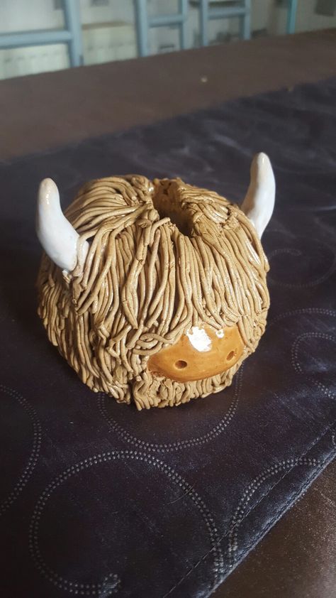 Highland Cow ceramic money bank Pottery Ideas Animals, Clay Bank Ideas, Clay Rattles Ideas, Ceramic Bank Ideas, Clay Rattles Ideas Ceramics, Homemade Piggy Banks, Clay Money Bank, Ceramic Rattle Ideas, Highland Cow Clay