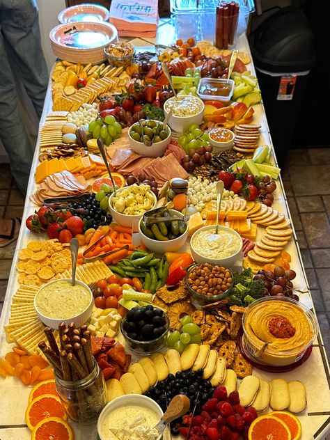 I put this charcuterie table together for my daughters graduation party and it was a huge hit! Graduation Party Grazing Table, Graduation Charcuterie Table, Graduation Grazing Table Ideas, Graduation Party Charcuterie Board, Charcuterie Graduation Party, Grad Party Veggie Tray, Charcuterie Board Graduation, Grad Party Charcuterie Board, Grad Charcuterie Board