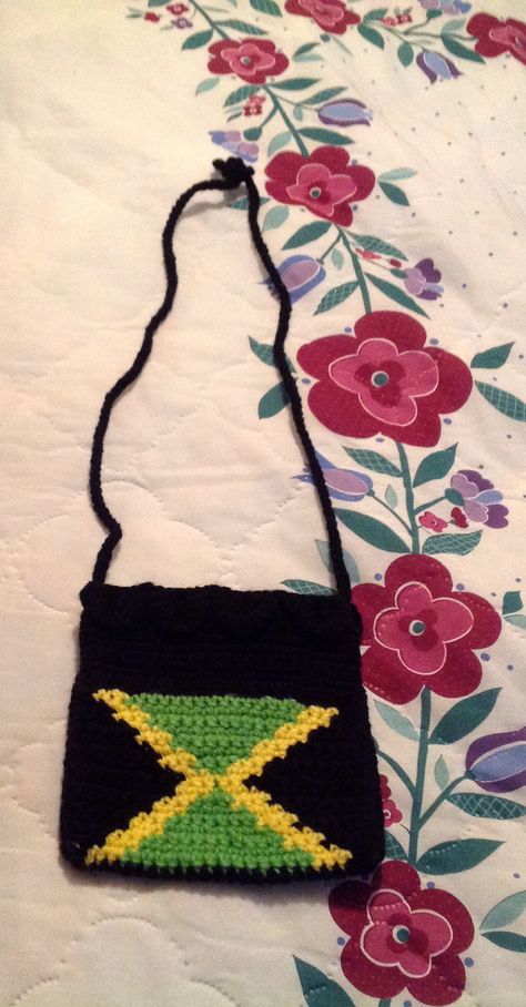 Jamaican crochet purse Jamaican Crochet, Crochet Purse, Crochet Items, Bag Crochet, Crochet Purses, Arm Candy, Crocheted Item, Jamaica, Cartoon Characters