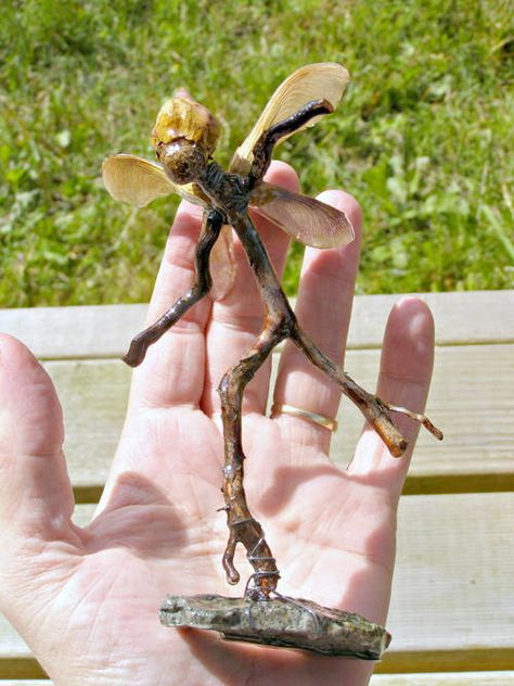 A garden fairy made of, sticks, a rock, wire and resin. I love the creativity. From Craftster blog site. Stick Fairy, Wire And Resin, Fairies And Dragons, Fairy Garden Furniture, Magic Crafts, Wire Ideas, Garden Bugs, Fairy Stuff, Grandparenting