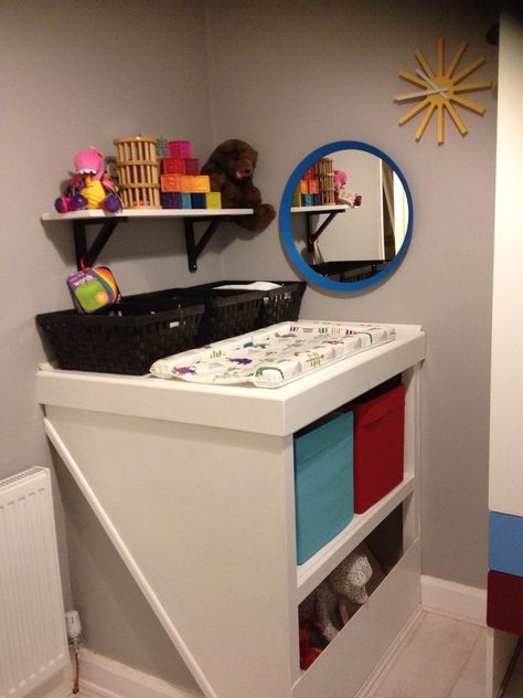 Home made built in changing table/ storage over bulk head. Bulkhead Nursery Ideas, Bulkhead In Bedroom, Stair Bulkhead Ideas Nursery, Stair Box In Bedroom Ideas Storage, Bulkhead Bathroom Ideas, Bulk Head Storage, Storage Over Stairs Bulkhead, Bulkhead Storage Ideas, Stairbox Ideas