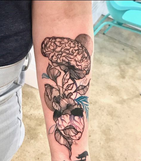 Brain tattoo with brainstem turning into heart obscured by exotic leaves and flowers. Done by Karolina Skulska ( Insta: @skvlska ). I wanted the brain to be the focus. Love how the artist captured that. The heart and forestry also remind me a little of Temple of Doom and Heart of Darkness Brain And Butterfly Tattoo, Nature Heart Tattoo, Flower Brain Tattoos, Sci Fi Tattoos, Shawn Roberts, Bloom Tattoo, Anatomy Tattoo, Brain Tattoo, Valkyrie Tattoo