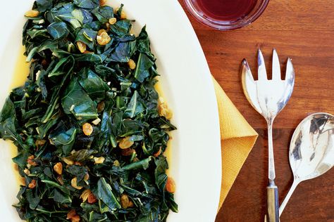 Citrus Collards with Raisins. "This is my signature dish," says Chef Bryant Terry proudly. "When it was first published, the recipe was my way of showing you can take traditional cuisine and reinvent it—I grew up on collard greens that weren't considered done unless they'd cooked at least two hours." Wilted Greens, Cooking With Coconut Milk, Raisin Recipes, Coconut Milk Recipes, Collard Greens, Milk Recipes, Vegetable Sides, Veggie Sides, Whole 30 Recipes