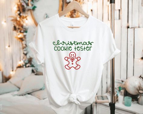 Adult Christmas Cookie Tester Gingerbread Man t-shirt. These are great for matching family shirts! Check out the Matching children's sizes! Premium soft quality Bella + Canvas unisex shirt. All shirts are made to order by me in the USA! Bella + Canvas unisex sizing in men tends to be true to size. Unisex sizing is a relaxed fit in women. Colors and size charts are shown in the images above. Measurements are approximate. Feel free to contact me with any questions! White and heather grey shirts wi April Baby Shower, Red And Black Shirt, Disney Vacation Shirts, Flattering Tops, Cute Baking, Bow Shirts, Baseball Outfit, Family Christmas Shirts, Grey Shirt