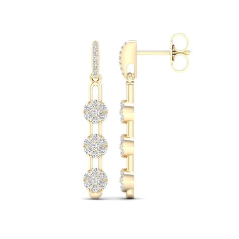 Elevate your weekend look with the modern details and eye-catching sparkle of these playful multi-diamond paper clip link drop earrings in 10K gold. Fashioned in warm 10K gold Each drop showcases a trio of diamond composites set along an open paper clip link-shaped dangle. Diamonds shimmer along the linear post to complete the look. These 1/3 ct. t.w. diamond earrings secure comfortably with friction backs. Diamond Jewelry Set, Gold Book, Peoples Jewellers, Drop Earring, Modern Earrings, Pendant Set, Diamond Stone, 10k Gold, Paper Clip