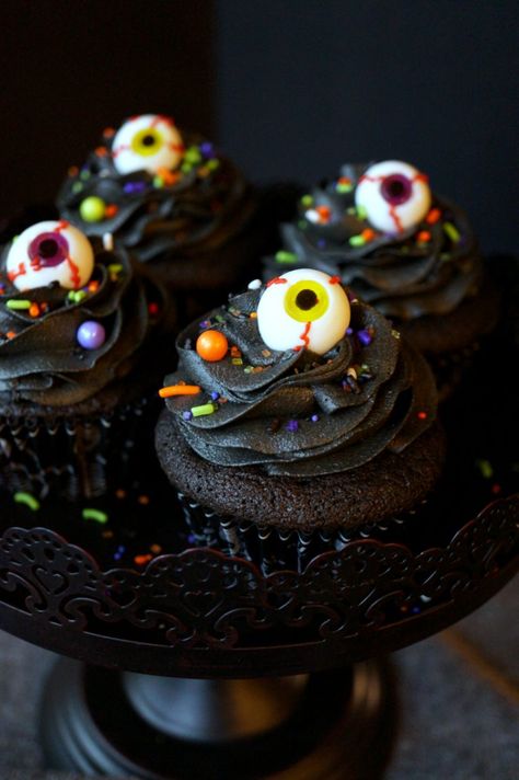 black chocolate cupcakes with slime filling | The Baking Fairy Gravestone Cookies, Prep Desserts, Chocolate Slime, Scary Halloween Food, Chocolate Cupcakes Filled, Halloween Food Ideas, Cupcakes Filled, Healthy Halloween Snacks, Spooky Food