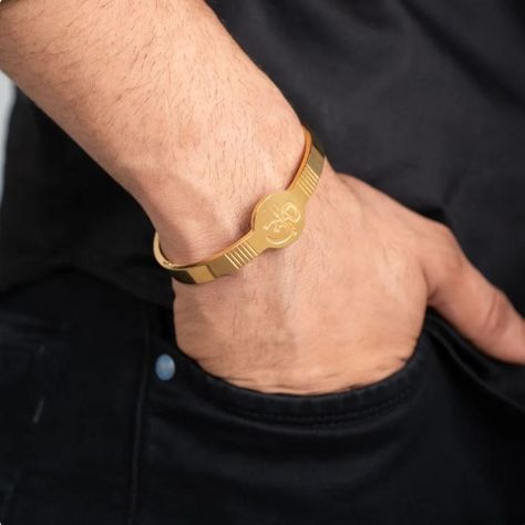 >This Trishul Om Bracelet is expertly crafted with 18k gold plating, providing both durability and elegance. The adjustable design ensures a perfect fit, while the included lock ensures security. A perfect accessory for those seeking spiritual alignment and style. For Order :- https://bit.ly/4dhTRrJ #jwellary #menswear #gold #jwellrydesign #jwellery #jwellerycollection #men #18kgoldplated #bengalscollection #braceletdesigns #giftshop #gift #gifts #GiftIdeas #goldplatted #goldplattedjewell... Spiritual Alignment, Om Bracelet, Bracelet Designs, Gold Plating, Gift Shop, 18k Gold, Gold Plate, Perfect Fit, Plating