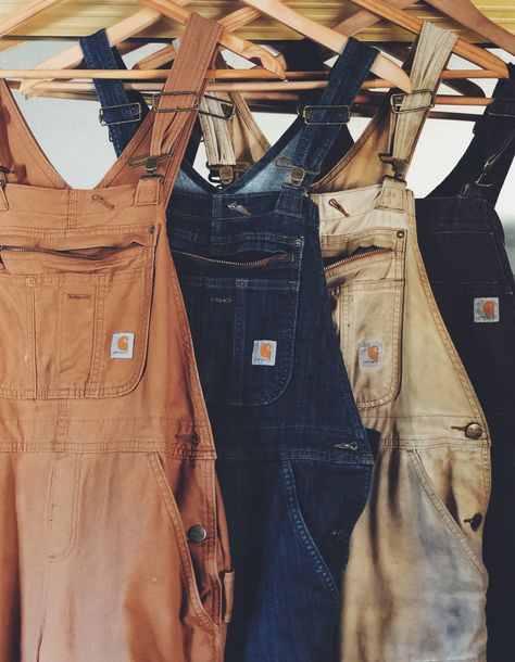 Four pairs of Carhartt overalls hanging up. Womens Coverall Outfit, Black Carhartt Overalls Outfit, Womens Carhartt Overalls Outfits, Construction Outfit Women, Carhartt Overalls Women Outfit, Gardening Outfits For Women, Womens Carhartt Overalls, Carhartt Overalls Women, Overalls Outfit Ideas