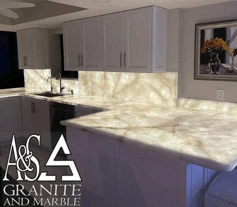 Cristallo quartzite backlit super exotic custom countertops with backlighting. Really makes the neatest parts of this granite pop. Exotic Countertop. Light Up Granite Countertop, Light Up Quartz Counter, Light Up Kitchen Countertop, Lighted Marble Countertops, Backlit Backsplash Kitchen, Backlit Quartzite Countertops, Glow In The Dark Marble Countertops, Glow In The Dark Countertops, Back Lit Countertop