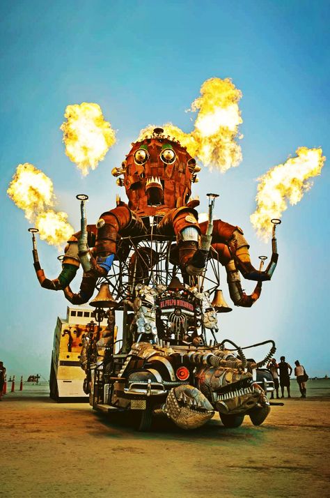 "The mechanical octopus known as El Pulpo Mecanico has long been a crowd favorite at Burning Man. It was built entirely from reclaimed scrap metal over the chassis of a 1973 Ford 250. Artist Duane Flatmo describes it as an art-installation on wheels. He's also known for his other mutant vehicles, including Crustacean Wagon, Tin Pan Dragon Wagon, and the Armored Carp." Mutant Vehicles, Kindergarten Kid, Music Festival Photography, Burning Man Art, Burning Men, Black Rock Desert, Maker Faire, Festival Photography, Burning Man Fashion