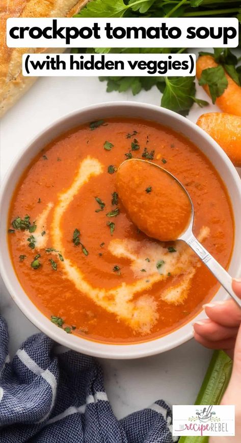 Slow Cooker Creamy Tomato Soup (with hidden veggies) is the best way to sneak some nutrients into the bowl of any picky eater. This flavorful, creamy tomato soup secretly features lots of carrots and celery. #recipe #dinner #soup | soup recipes | easy dinner | healthy soup | tomato soup | slow cooker soup | slow cooker recipes | easy dinner ideas Crock Pot Soups And Stews Healthy, Tomato Soup In Crockpot, Tomato Soup Crockpot Recipes, Tomato Soup Crock Pot, Crock Pot Tomato Soup, Healthy Crockpot Tomato Soup, Easy Crockpot Tomato Basil Soup, Slow Cooker Creamy Tomato Soup, Tomato Basil Soup Slow Cooker