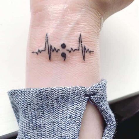 32 Empowering Semicolon Tattoos To Carry On The Hope Of Life Stay Tattoo, Semicolon Wrist Tattoo, Semicolon Tattoo Meaning, Semicolon Tattoos, Awareness Tattoo, Heartbeat Tattoo, Tattoos Infinity, Tato Henna, Semicolon Tattoo