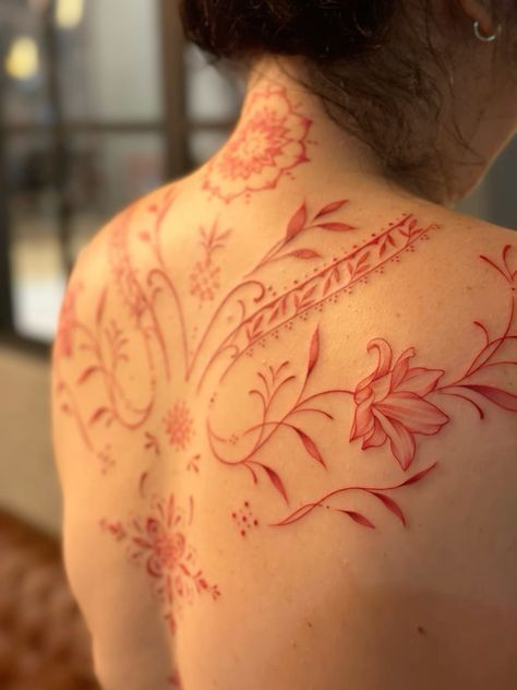 Red Ink Vine Tattoo, Red Tattoos For Black Women, Aztec Back Tattoo Women, Red Vines Tattoo, Minimal Lower Back Tattoo, Red Feminine Tattoo, Astrantia Tattoo, Pretty Red Tattoos, Back Tattoo Vines