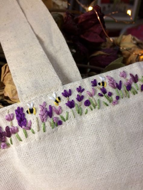 Cloth Bag Embroidery, Embroidery Aesthetic Clothes, Flower And Bee Embroidery, Embroidery Flowers Lavender, Lavender And Bee Embroidery, Simple Flower Stitch Embroidery, Simple Bee Embroidery Tutorial, Embroidered Bee Simple, Simple Lavender Embroidery