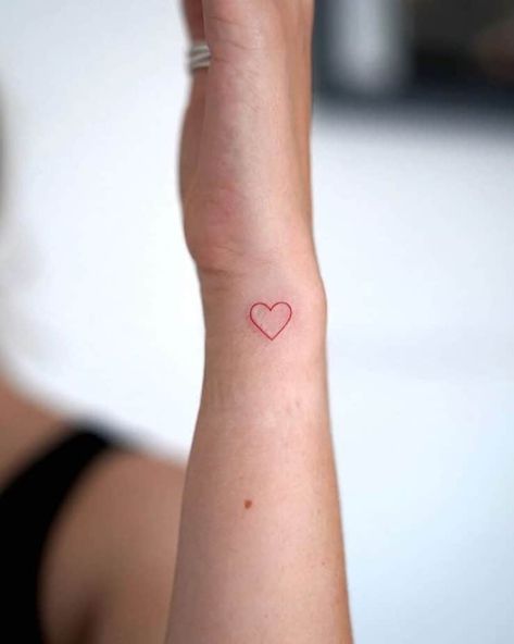 23. A red ink small heart hand tattoo Hand Drawn Heart Tattoo, Heart Hands Tattoo, Small Red Ink Tattoo, Heart Hand Tattoo, Red Ink Tattoos Small, Cutest Tattoos, Tiny Heart Tattoo, Red Heart Tattoo, Small Heart Tattoo