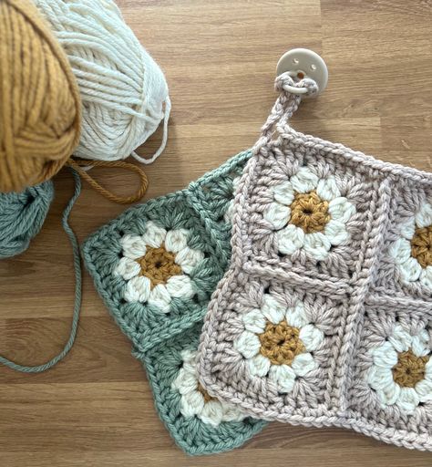 Hand crocheted daisy granny square baby comforter / lovey / security blanket. Hand crocheted with loop to attach soother (dummy/pacifier). Approx 24x24cm.  Hand made with love using Lion Brand yarn. 80% Acrylic, 20% wool.  The yarn colours pictured are: - desert, salt and mustard ("desert"); and - sage, salt and mustard ("sage") Soother not included.  Machine washable and dryable. Can be gently stretched back into shape.  Please do not leave unattended with baby. Sage Salt, Crocheted Daisy, Daisy Granny Square, Small Baby Blankets, Soother Holder, Crochet Daisy, Baby Bassinet, Baby Lovey, Lion Brand Yarn