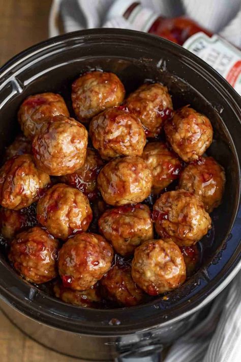 Cocktail Meatballs are the PERFECT appetizer made with frozen meatballs, grape jelly, and chili sauce, easy to throw together and only 3 ingredients! #appetizer #cocktailmeatballs #grapejellymeatballs #slowcooker #crockpot #chilisauce #homemade #recipe #easy #fast #dinnerthendessert #holidays Easy Cocktail Meatballs, Jelly Meatball Recipe, Cocktail Meatball Recipes, Homemade Meatballs Easy, Grape Jelly Meatballs Recipe, Meatball Appetizer Recipe, Meatball Recipes Crockpot, Jelly Meatballs, Meatball Dinner