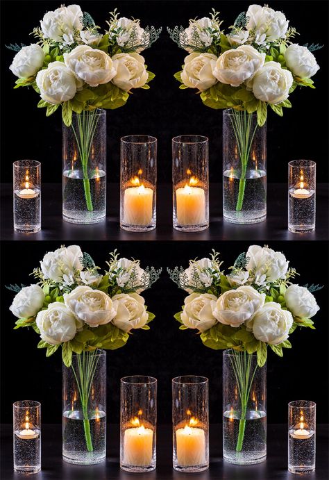 PRICES MAY VARY. 【Elegant & Sturdy】-- Our clear glass cylinder vases are made of thick and sturdy hand-blown glass with a raindrop/wet/bubble look that makes them visually interesting. If you are using a shorter candle, the light really reflects off the bubbles and gives it a unique look. When you want the arrangement to stand out more than the vase, then go for these. They are a perfect accent to a simple or complex arrangement. 【Beautiful & Practical】-- These clear glass hurricane candle holde Tall Cylinder Vase Centerpiece Wedding, Tall Cylinder Vase Centerpiece, Cylinder Vase Centerpiece Wedding, Glass Cylinder Ideas, Glass Cylinder Centerpieces, Cylinder Vase Centerpiece, Cylinder Centerpieces, Fishbowl Centerpiece, Center Peices