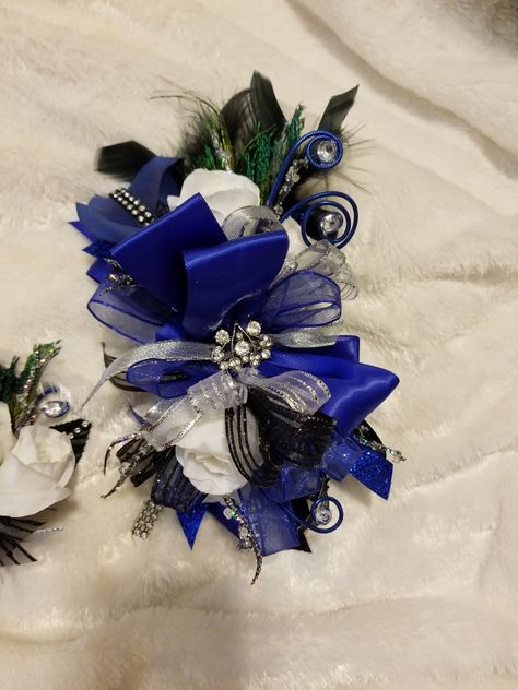 Blue And Black Corsage Prom, Royal Blue And Black Corsage, Royal Blue Corsage And Boutonniere, Hoco 2022, Corsage Flowers, Prom Jacket, Black Corsage, Blue Corsage, Chloe And Paige