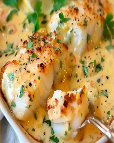 Savory Baked Cod in Coconut-Lemon Cream Sauce Recipe - optimal recipes Cod With Coconut Milk, Fish In Coconut Milk Recipes, Fish Recipes With Coconut Milk, Easy Cod Recipes, Cod Loin Recipes, Fish In Coconut Milk, Optimal Recipes, Baked Cod Recipes, Cream Sauce Recipe