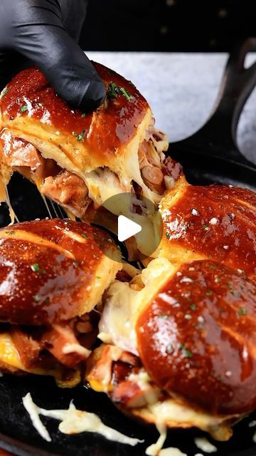 Ryan Carter 🍻 on Instagram: "BBQ Chicken Sandwiches on pretzel buns.
 
Smokey sweet BBQ sauce over grilled chicken, melted cheese, and buttery pretzel buns. MAKE THESE 🔥

INGREDIENTS:
+ Grilled BBQ Chicken
+ Pretzel buns
+ Colby jack cheese, sliced
+ BBQ sauce
+ Red onion
+ Mozzarella cheese, shredded
+ Brush with garlic butter
 
Bake in the oven at 350°F for 15 minutes and enjoy!

#bbqchickensandwich #bbqchicken #bbq #kingshawaiian #sliders #casitamaderecipes" Chicken Pretzel, Bbq Chicken Sandwiches, Pretzel Buns, Sweet Bbq Sauce, Bbq Chicken Sandwich, Pretzel Bun, Grilled Bbq Chicken, Colby Jack, Chicken Sandwiches