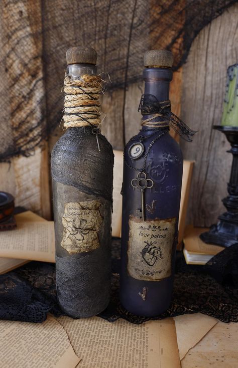 Step into the realm of magic and mystery with our handcrafted Halloween potion bottles, perfect for adding a touch of enchantment to your Halloween decor. Each bottle is uniquely crafted to capture the essence of ancient apothecaries. Bottles can be left empty or filled with items such as food colored water, sand, feathers, flowers, etc. **Each bottle will vary slightly in charms, emblems, and design as they are all unique** Upcycle Medicine Bottles, Glass Bottle Crafts Home Decor, Halloween Poison Bottles, Apothecary Halloween Decor, Vampire Doctor, Potion Bottle Labels, Creepy Halloween Party, Water Bottle Crafts, Halloween Potion