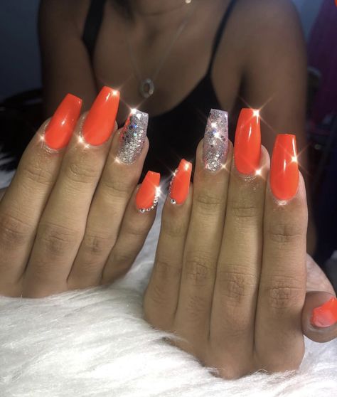 cute vibrant red/orange coffin acrylic nails for the summer #acrylicnails #summernails #coffinnails #vibrant #orange #shimmer Orange Nails With Design Summer, Orange Nails With Rhinestones, Yellow And Orange Nails Design, Orange And Silver Nails, Orange Prom Nails, Hoco Corsage, Black Sparkle Nails, Black Prom Nails, Neon Orange Nails