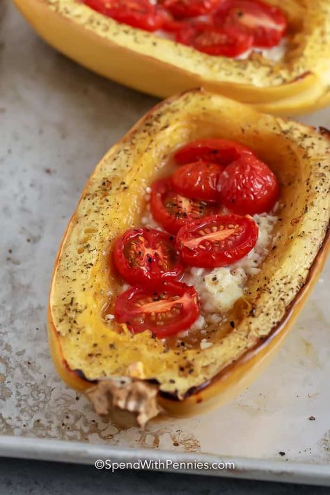 Feta Spaghetti Squash is a keto lover's dream! It's a low-carb meal with sprinkles of cheese and fresh tomatoes, perfect for the whole family! This meatless meal is also easy on the wallet, and easy to make!  #spendwithpennies #spaghettisquashboats #maindish #recipe Spaghetti Squash Cheese, Spaghetti Squash With Roasted Tomatoes And Feta, Spaghetti Squash With Feta Cheese And Tomatoes, Spaghetti Squash And Tomato Recipes, Spaghetti Squash And Feta, Spaghetti Squash Recipes With Feta And Tomatoes, Feta Cheese Spaghetti Squash, Spaghetti Squash Feta Bake, Baked Feta Pasta With Cherry Tomatoes Spaghetti Squash