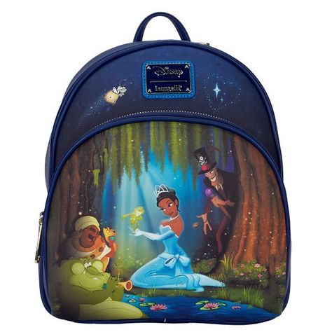 The Disney Princess And The Frog Bayou Scene Mini Backpack Is Here To Light Up Your Collection! The Front Pocket Depicts A Vibrant Scene Of Tiana Holding Prince Naveen As A Frog With Dr. Facilier Lurking In The Background. On The Second Pocket Raymond The Firefly And The Star Light Up On Either Side Of The Branded Metal Plaque. It’s A Gorgeous Design That Is A Must Have For Any Collection Of The Princess And The Frog. The Loungefly Disney Princess And The Frog Bayou Scene Mini Backpack Is Made Of Vegan Leather (Polyurethane) With Faux Suede Trim. Bag Has Adjustable Shoulder Straps, Side Pockets, Sturdy Metal Hardware, And Features: Led Lights, Embroidered, And Printed Details. Ta Princess And The Frog Bayou, Disney Bags Backpacks, Disney Princess Tiana, Mini Mochila, Princess And The Frog, Princess Tiana, Loungefly Bag, Disney Bag, Loungefly Disney