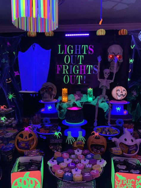 Lights Out Frights Out Candy Table Black Light Party Halloween, Glow In Dark Halloween Party, Halloween Party Ideas Glow In The Dark, Halloween Blacklight Party, Halloween Black Light Decorations, Halloween Party Black Light, Neon Trunk Or Treat, Lights Out Frights Out, Halloween Party Candy Table