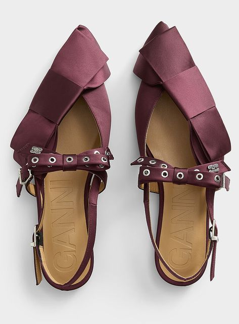 Founded by Ditte and Nicolaj Reffstrup, Ganni brings creativity and personality to its Scandinavian fashion roots for designs made to stand out. These shoes showcasing a delicate pointed-toe silhouette in an ultra-trendy burgundy tone, two decorative bows, and silvery hardware will add the perfect finishing touch to your refined outfits.- Sateen upper- Polyester strap with faux-leather underside- Pointed toe- Cushioned faux-leather insole- Smooth faux-leather outsole- Signature storage bags included- Made in Portugal- Model number: S2860 Scandinavian Fashion, Decorative Bows, Womens Ballet Flats, Tandem, Ballet Flats, Bag Storage, Faux Leather, Bring It On, Satin