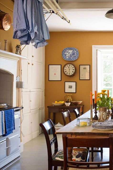 Brighten your home with seasonal tones such as mustard yellow. Whilst mustard yellow can make a statement among a more muted decorative style, it is much more usable than many would think. Mustard Yellow Paint Colors, Mustard Living Rooms, Mustard Kitchen, Mustard Yellow Kitchens, Mustard Yellow Paints, Yellow Painted Walls, Mustard Yellow Walls, Yellow Paint Colors, Mustard Walls