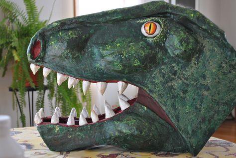 T-Rex head, paper mache. 2014 Cardboard Masks, Dinosaur Wedding, Dinosaur Birthday Decorations, Make A Dinosaur, Cardboard Mask, Dinosaur Head, Dinosaur Crafts, Dinosaur Costume, Homemade Halloween