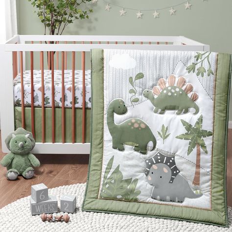 PRICES MAY VARY. This nursery bedding set includes a stylish trio of must haves that includes a coordinating fitted crib sheet, baby comforter and crib skirt to start building your dream baby’s room The reversible crib comforter is generously sized at 32" x 41" and features three green dinosaur friends in a lush jurassic landscape. The reverse side coordinates perfectly with the crib sheet. The fitted crib sheet is designed for a standard 28” x 52” crib mattress with snug fitting all around elas Dinosaur Crib Bedding, Yellow Dinosaur, Bathing Products, Dinosaur Nursery Decor, Bedding Blue, Crib Comforter, Boy Nursery Themes, Crib Bed, Girl Bedding