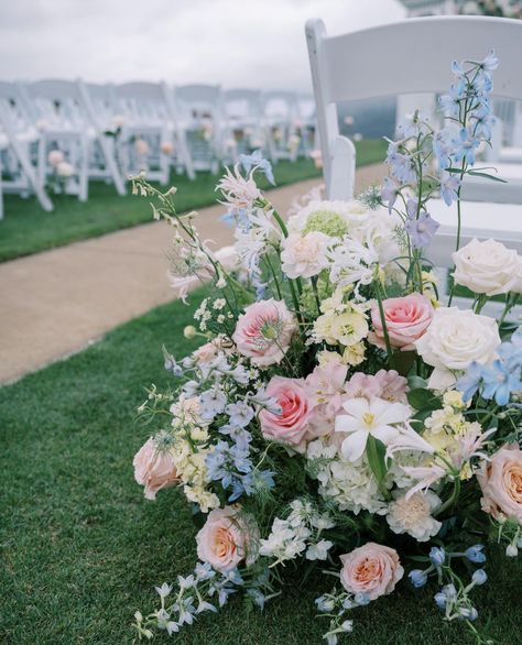 Pink Blue Wedding Bouquet, Pastel Wedding Aisle, Flowers On Pedestal Wedding, Pink Blue Green Wedding, Pink And Blue Spring Wedding, Pink And Blue Wedding Flowers Floral Arrangements, Delphinium Aisle Flowers, Colourful Wedding Bouquet, Wedding Altar Flowers