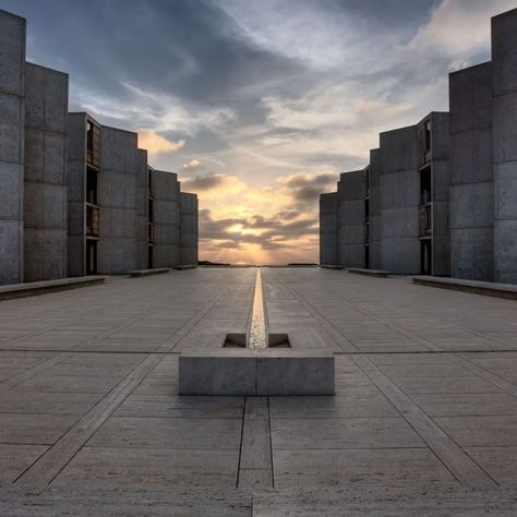 The Salk Institute. A Building of Wonder  Situated in California and commissioned by Jonas Salk, the institute embodies his vision for fostering scientific research and collaboration. The architect responsible for its iconic design, Louis Kahn, is celebrated for his groundbreaking use of concrete, structurally and aesthetically. Kahn seamlessly blends functionality with profound architectural elegance, defining not only the institute's aesthetic appeal but also supporting its scientific mis... Louis Kahn Architecture, Luis Kahn, Salk Institute, Jonas Salk, Concrete Buildings, Louis Kahn, Light Shadow, Scientific Research, Concrete Structure