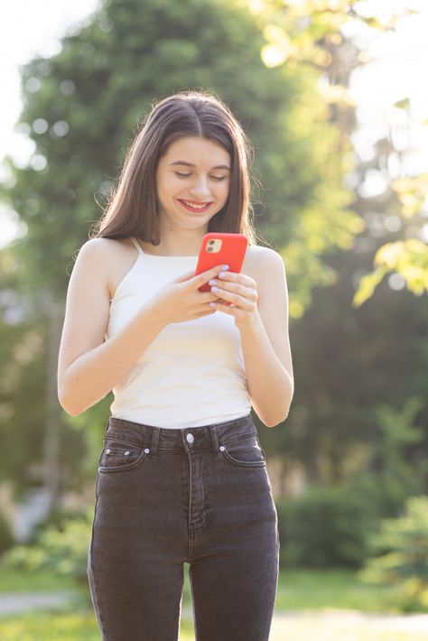 Someone Looking At Their Phone, Girl Holding Phone Reference, Person With Phone Reference, Using Phone Reference, Person Looking At Phone Reference, Looking At Phone Pose, Posing With Phone, On Phone Reference, Holding Phone Pose