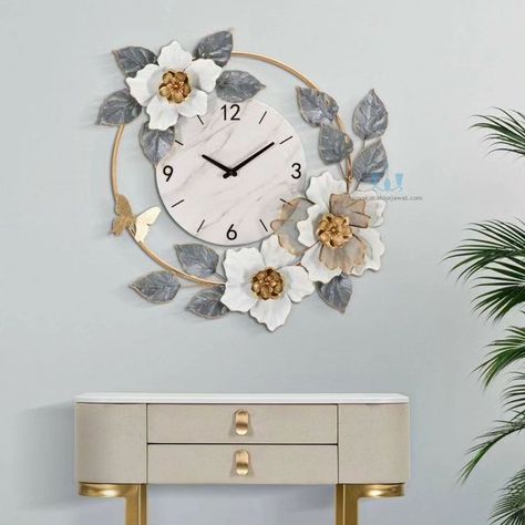 A Complement Of Unparalleled Refinement! Round-Shaped Decorative Wall Clock With White Dial Is Made Even More Elegant By The Rich Decoration That Accompanies A Composition Of  Flowers, Leaves and Butterfly In Metal Worked With Colors Such As Gold, White And Grey, All Elements That Create an Enchanting Wall Clock..🤍 Newly Launched "Romantic Garden Floral Wall Clock" Exclusively @ bit.ly/ss_romanticgardenfloralwallclock #the_decor_that_defines_you #homedecor #interior #architect #romantic #ga... Small Garden Statues, Golden Furniture, Mantelpiece Decor, Classic Wall Decor, Ceramic House Numbers, Golden Decor, Marble Candle Holder, Golden Wall, Marble Candle