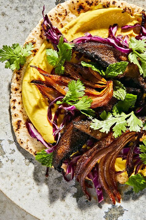 Vegetarian Mushroom Shawarma Pitas Recipe - NYT Cooking Pitas Recipe, Mushroom Shawarma, Red Cabbage With Apples, Roasted Portobello Mushrooms, Greek Yogurt Sauce, Pita Recipes, Braised Red Cabbage, Vegetarian Cabbage, Spinach Soup