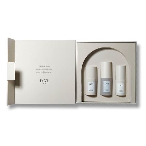 A 3-piece travel skincare set featuring an overnight mask to smooth and tighten skin, a skin mist for a hydration boost, and a vitamin C serum to reduce fine lines and dark spots. Skincare Set Packaging Design, Beauty Set Packaging, Skincare Set Packaging, Skincare Kit Packaging, Beige Packaging Design, Unique Cosmetic Packaging, Skin Care Packaging Ideas, Cosmetic Packaging Design Luxury, Skincare Set Package