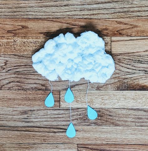 Simple cloud craft 🌧️  Cut out your cloud shape and rain drops. Paint or color you rain drops first. Put glue on paper for dipping the cotton balls. While your little one is filling their cloud with cotton balls attach strings to rain drops. I used hot glue for a quick dry but any glue would work. Once your cloud is complete glue other end of strings under cotton balls at the bottom of your cloud. 🌧️ Clouds With Cotton Balls, Recital Decorations, Rain Craft, Rain Crafts, Preschool Weather, Storytime Crafts, Mobile Craft, Weather Crafts, Cloud Craft