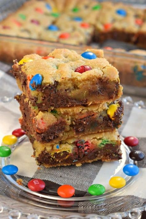 Chewy M&M's Chocolate Chip Cookie Bars are thick and delicious and perfect when you need a quick dessert. Perfect for holidays and bake sales too! Chocolate Chip M&m Cookie Bars, Cookie Bars M&m, M And M Desserts, M M Desserts, M&m Bars Recipe, M&m Cookie Bars, Mm Bars, Chocolate Chip Cookie Bar, M M Cookie Bars