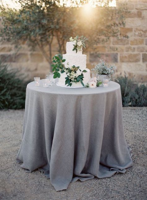 simple white three tiered cake with cascading foliage The Vault: Curated & Refined Wedding Inspiration - Style Me Pretty Sunstone Vineyard Wedding, Grey Wedding Theme, Gray Wedding Colors, Natural Linen Tablecloth, Wedding Theme Inspiration, Theme Inspiration, Wedding Table Linens, Cake Table Decorations, Wedding Cake Table