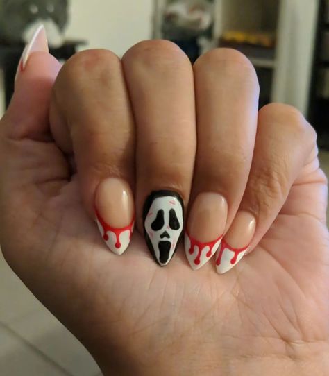 Acrylic nails with Ghostface and blood drip design, stiletto/almond shape Ghost Face Nails Almond, Gost Face Nail Art, Ghostface Nails Almond, Ghostface Halloween Nails, Short Ghostface Nails, Halloween Nails Ghostface, Nails Ghostface, Stiletto Almond Nails, Blood Drip Nails