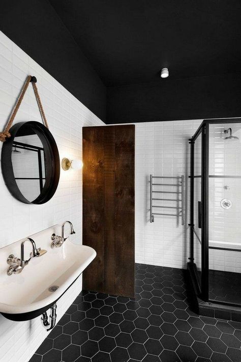 Enhance the visual appeal by incorporating various textures. Matte and glossy finishes on tiles, textured wallpaper, or patterned textiles can add depth and interest to the overall design. #Tags: #BathroomDesign #BlackAndWhiteDecor #MonochromeStyle #BloxburgIdeas #MinimalistBathroom #HalfBathroomInspo #GeometricPatterns #VintageVibes #ModernDesign #InteriorDecor #HomeRenovation #IndustrialBathroom #ArtisticDecor #HomeImprovement #GreeneryInDesign #SleekInteriors White Half Bathroom Ideas, White Half Bathroom, Black And White Half Bathroom, White Tile Bathroom Floor, Black Ceilings, Black Tile Bathroom Floor, Half Bathroom Ideas, Black Tile Bathrooms, Dark Ceiling