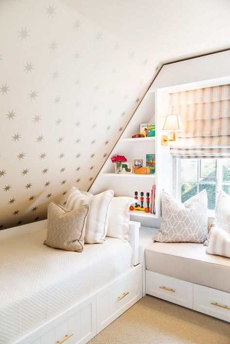 Kid's room with sloped ceiling, gold star wallpaper, and built-in bookshelves. Teenage Attic Bedroom, Attic Design Ideas, Small Attic Room, Attic Room Ideas, Attic Bedroom Small, Attic Bedroom Storage, Attic Bedroom Designs, Attic Playroom, Small Attic