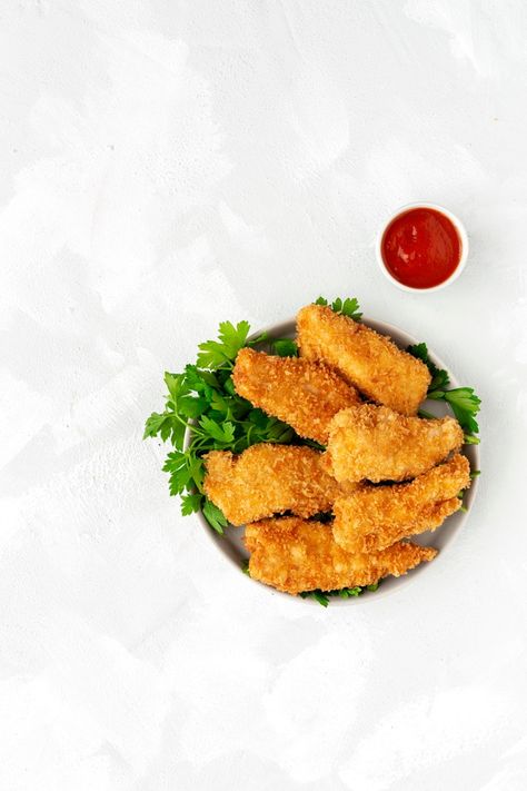 Homemade chicken nuggets battered with p... | Premium Photo #Freepik #photo #food #chicken #golden #meat Nugget Photography, Veal Schnitzel, Shrimp Fritters, Zucchini Sticks, Homemade Chicken Nuggets, Chicken On A Stick, Homemade Croissants, Organic Bread, Homemade Chocolate Chips