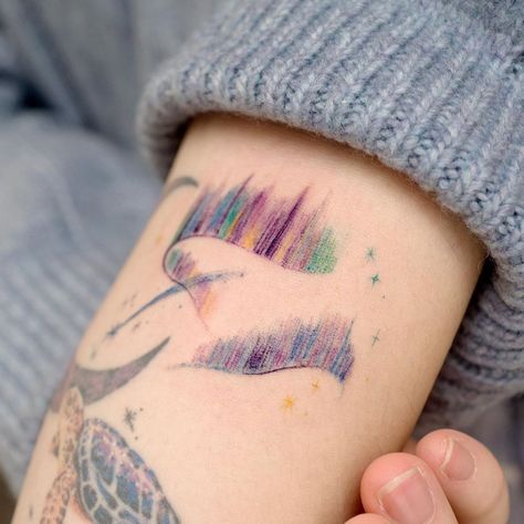 Tattoo uploaded by Ovenlee Tattoo | Illustrative watercolor tattoo by Ovenlee #Ovenlee #OvenleeTattoo #StudioBySol #watercolor #illustrative #colorpencil #sketch #cute #auroraborealis #northernlights #stars #nature #sky #sparkle #rainbow #color | 1281210 | Tattoodo Light Tattoo Ideas, Aurora Borealis Tattoo, Icelandic Tattoo, Aurora Tattoo, Northern Lights Tattoo, Atrapasueños Tattoo, Rainbow Tattoos, Light Tattoo, Tattoo Now